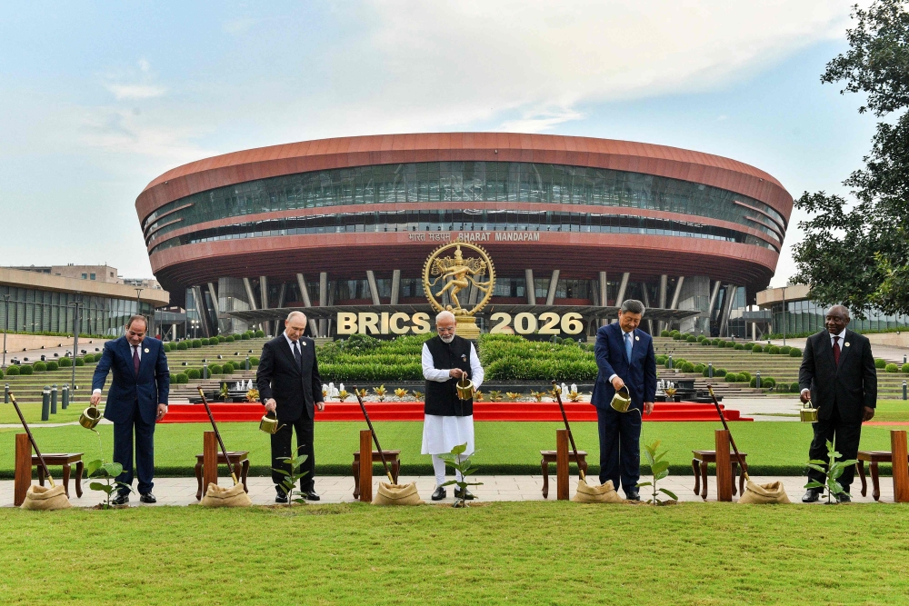 (From left) Egypt’s President Abdel Fattah al-Sisi, Russia’s President Vladimir Putin, India’s Prime Minister Narendra Modi, China’s President Xi Jinping and South Africa’s President Cyril Ramaphosa planting trees during the 18th Brics Summit in New Delhi September 12, 2026. — India’s Ministry of External Affairs handout pic via AFP