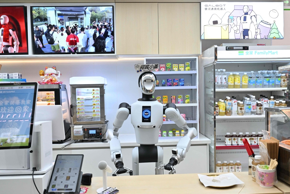A Galbot robot waits to serve customers at a mini market in Beijing September 22, 2026. — AFP pic