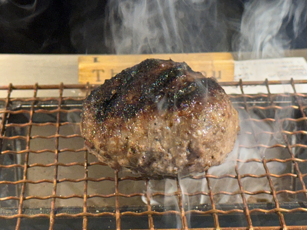 You get your own personal grill in front of your seat that keeps the patty warm. 