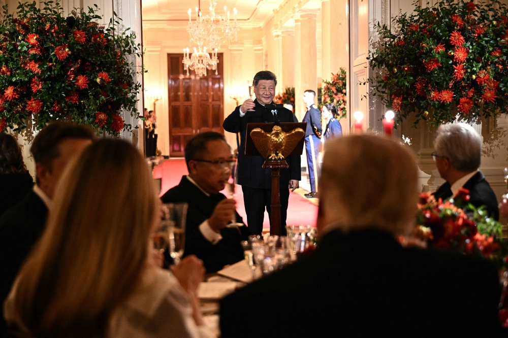 China’s President Xi Jinping proposes a toast during a State Dinner hosted by US President Donald Trump in the East Room of the White House in Washington, DC, on September 24, 2026. — AFP pic