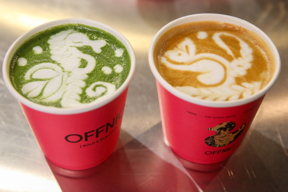 Izumi Matcha Latte features a seahorse (left) while the latte has a squirrel (right) on top of the drink. — Picture by Choo Choy May
