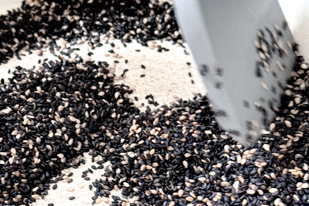 Stir-fry the sesame seeds, stirring regularly to ensure they toast evenly — Picture by CK Lim
