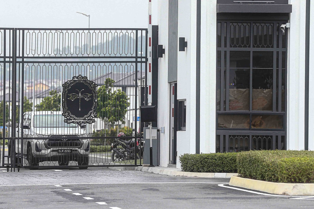 A residential entrance with controlled access. Rules governing guarded communities cover issues including barriers, access arrangements, guardhouses and residents’ rights. — Picture by Sayuti Zainudin