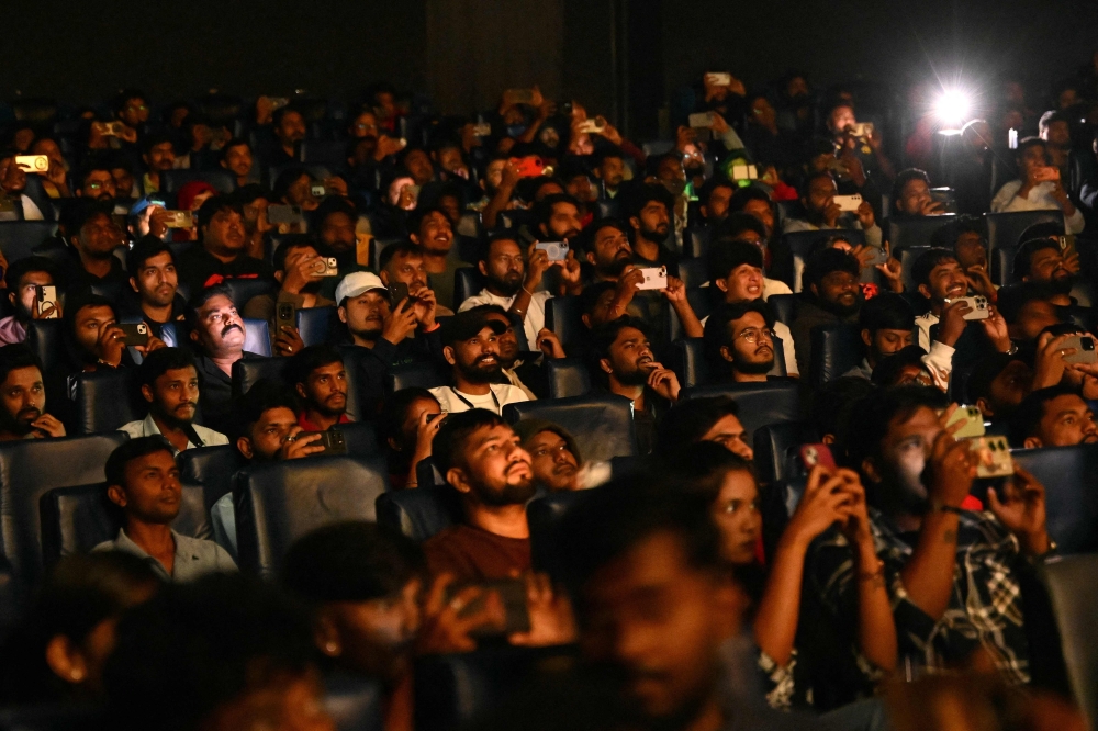 People watch the early morning show of the newly released Kannada film ‘Toxic’ at the single-screen Mukunda Theatre in Bengaluru August 26, 2026. — AFP pic