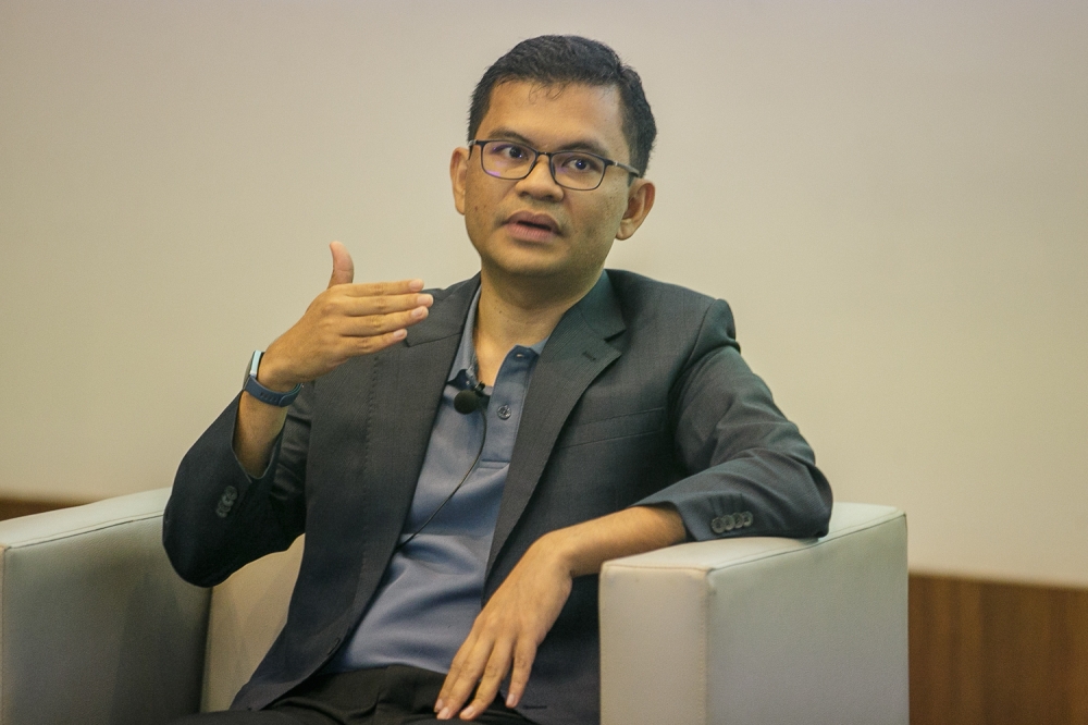 Economy Minister Akmal Nasrullah Mohd Nasir says rising global coal and liquefied natural gas prices are adding to electricity generation costs as Malaysia’s power demand continues to grow. — Picture by Raymond Manuel