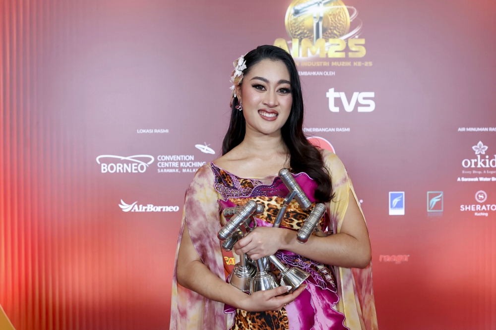 Aisha Retno, winner of the Best Album award for Rehab, is seen after being interviewed at the 25th Anugerah Industri Muzik (AIM) held at the Borneo Convention Centre Kuching September 26, 2026. — Bernama pic