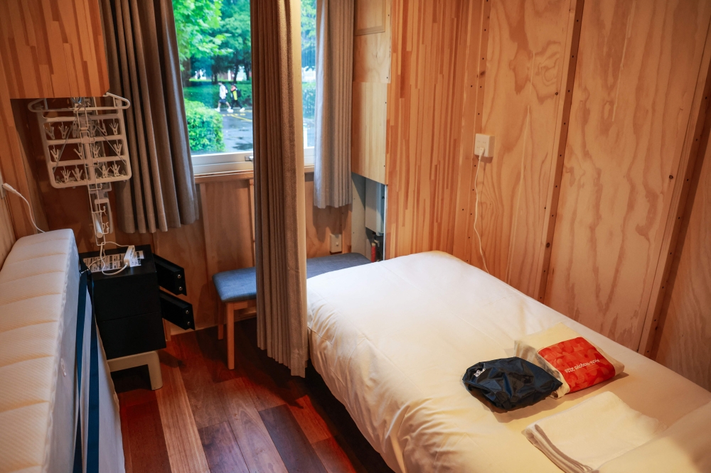 This photo shows a room in a temporary container hut during a press tour of the athletes’ village during the 2026 Asian Games at the Garden Pier in Nagoya September 27, 2026. — AFP pic