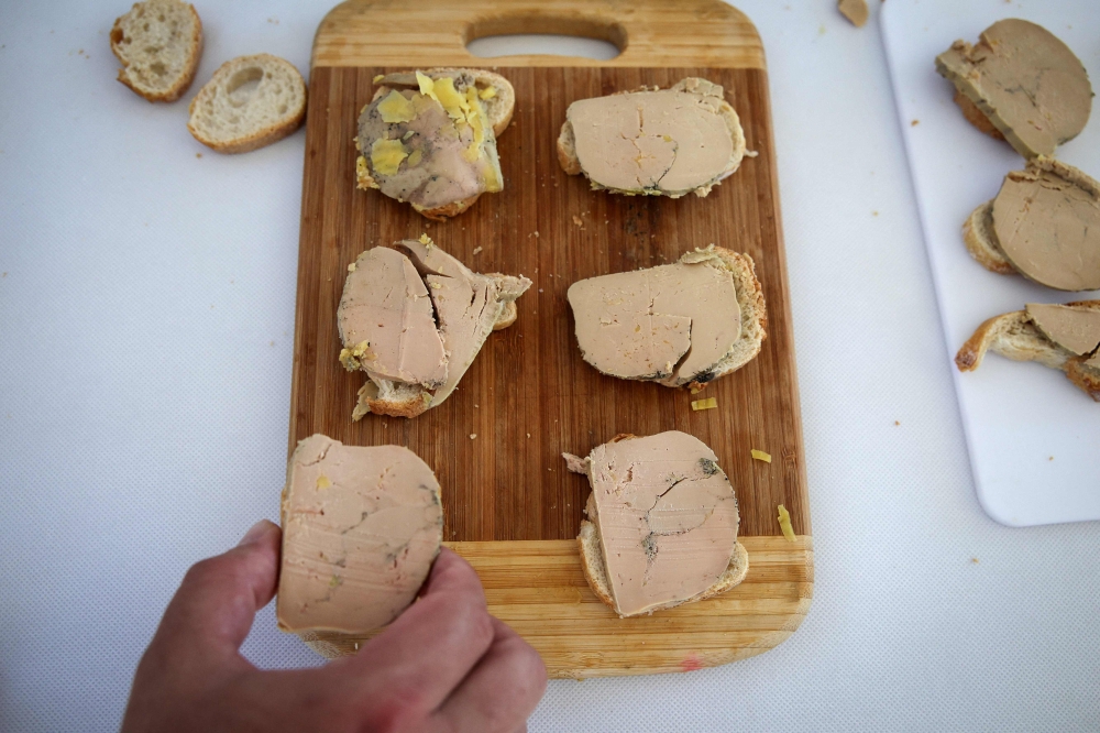 A photograph shows slices of foie gras on the first day of the national duck vaccination campaign, in Labarthete, southwestern France September 2, 2023. — AFP pic