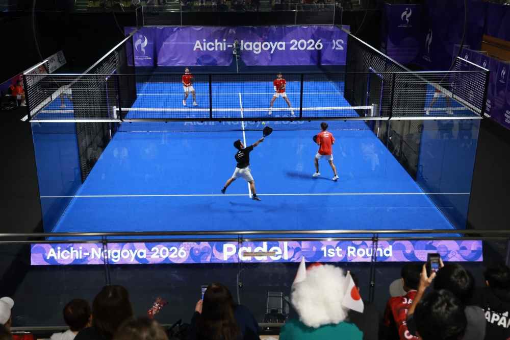 Japan’s Teruaki Ando and Shinnosuke Nakamura (front) play a point against Lebanon’s Tamim El Hallak and Ralph Tohme during the men’s pairs padel first round match at the Nagoya City Highashi Sports Center in Nagoya on September 28, 2026. — AFP pic