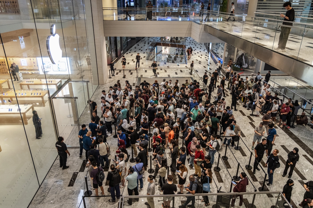 People line up to buy the newly launched iPhone 18 and other Apple products at Apple store at Tun Razak Exchange (TRX) in Kuala Lumpur on September  18, 2026. — Picture by Firdaus Latif