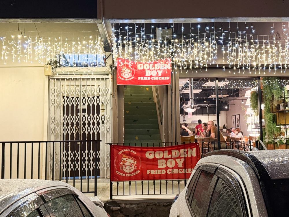 Look for the banners for Golden Boy Fried Chicken, which is right above Farm to Plate restaurant in Damansara Kim. — Picture by Lee Khang Yi