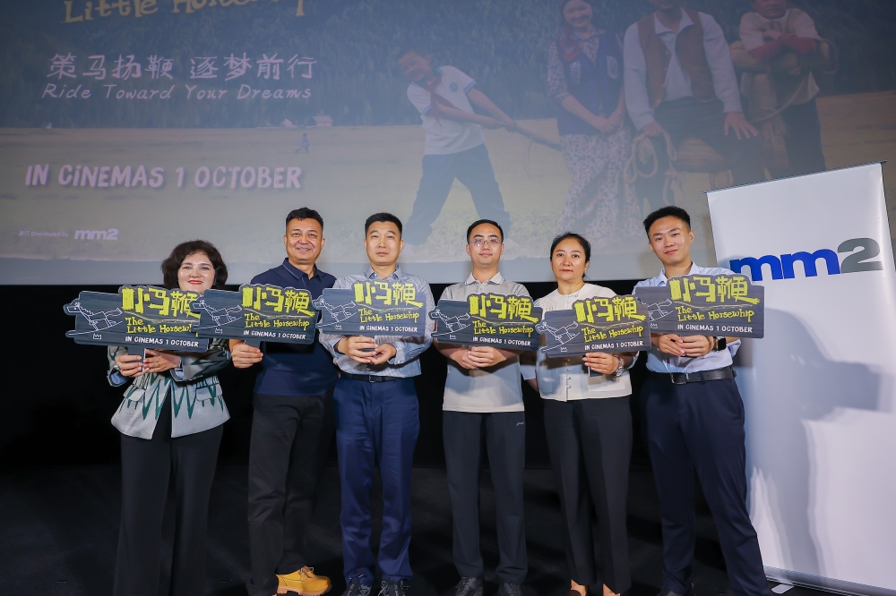 ‘The Little Horsewhip’ producer Li XiaoBing (centre-right) with members of the team behind the film at its press screening at Pavilion Bukit Jalil. — Picture courtesy of Click Entertainment