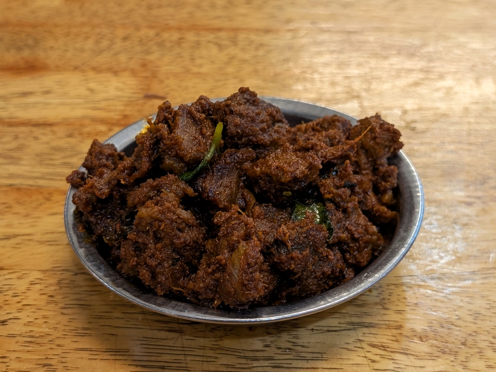 A full portion of boneless mutton ‘varuval’. — Picture by Ethan Lau