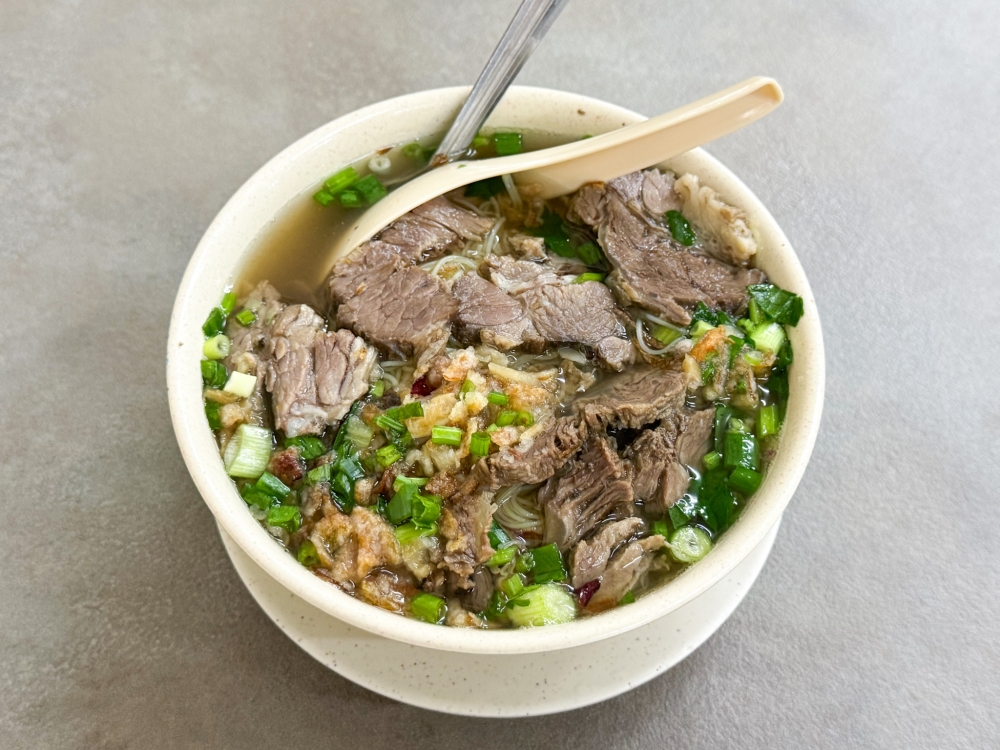 Bihun Sup Daging may look small but it’s big on beef flavour with the boiled meat cut into slices and a robust beef broth. — Picture by Lee Khang Yi