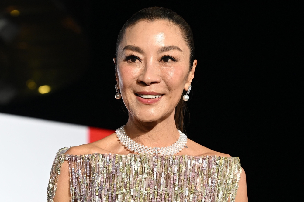 Malaysian actress Michelle Yeoh arrives on the red carpet during the opening ceremony of the 31st Busan International Film Festival (BIFF) at the Busan Cinema Center in Busan October 6, 2026. — AFP pic