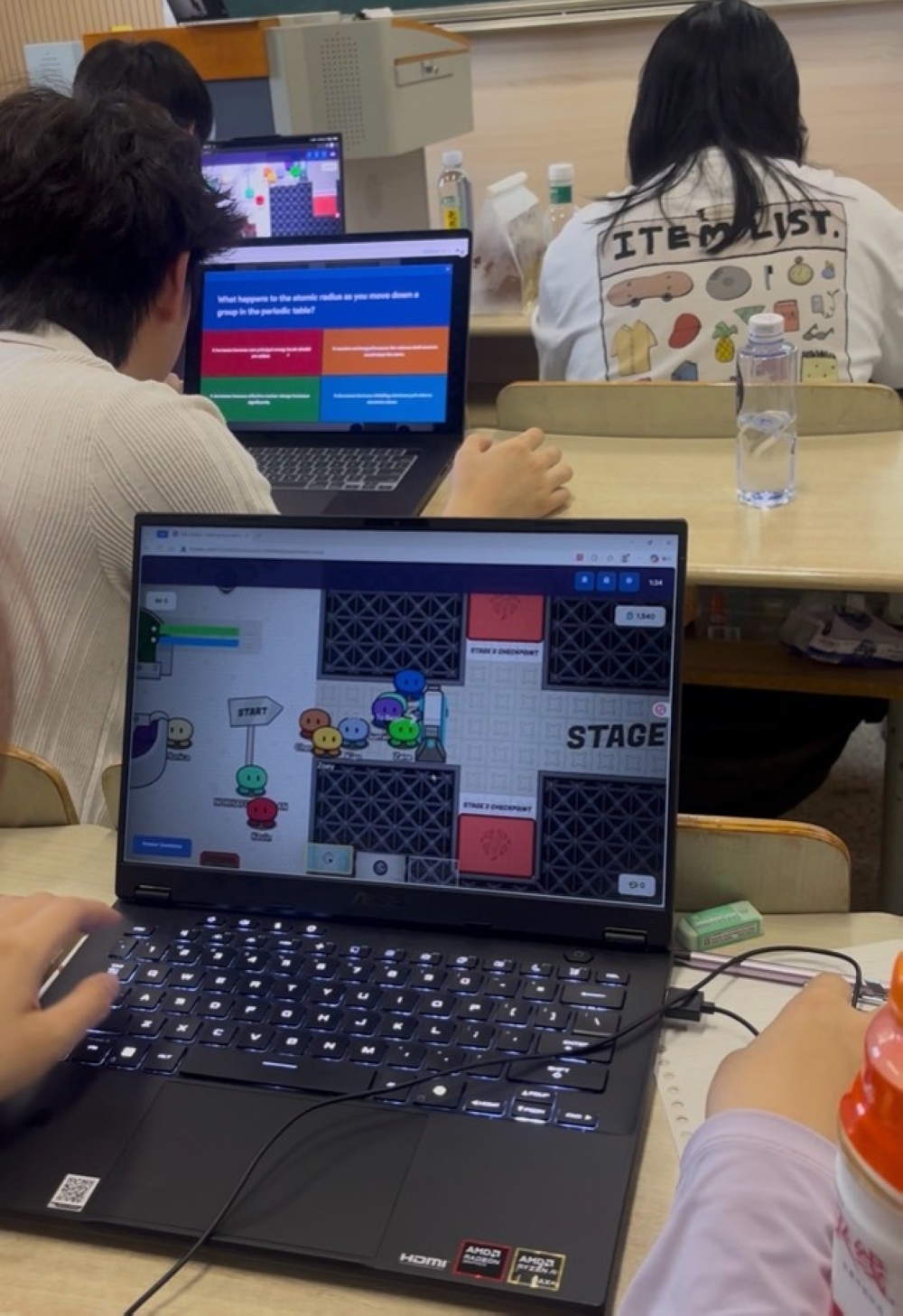 Students participate in interactive online games designed to encourage quick thinking and problem-solving during chemistry lessons. — Picture courtesy of Norhafiza Roslan