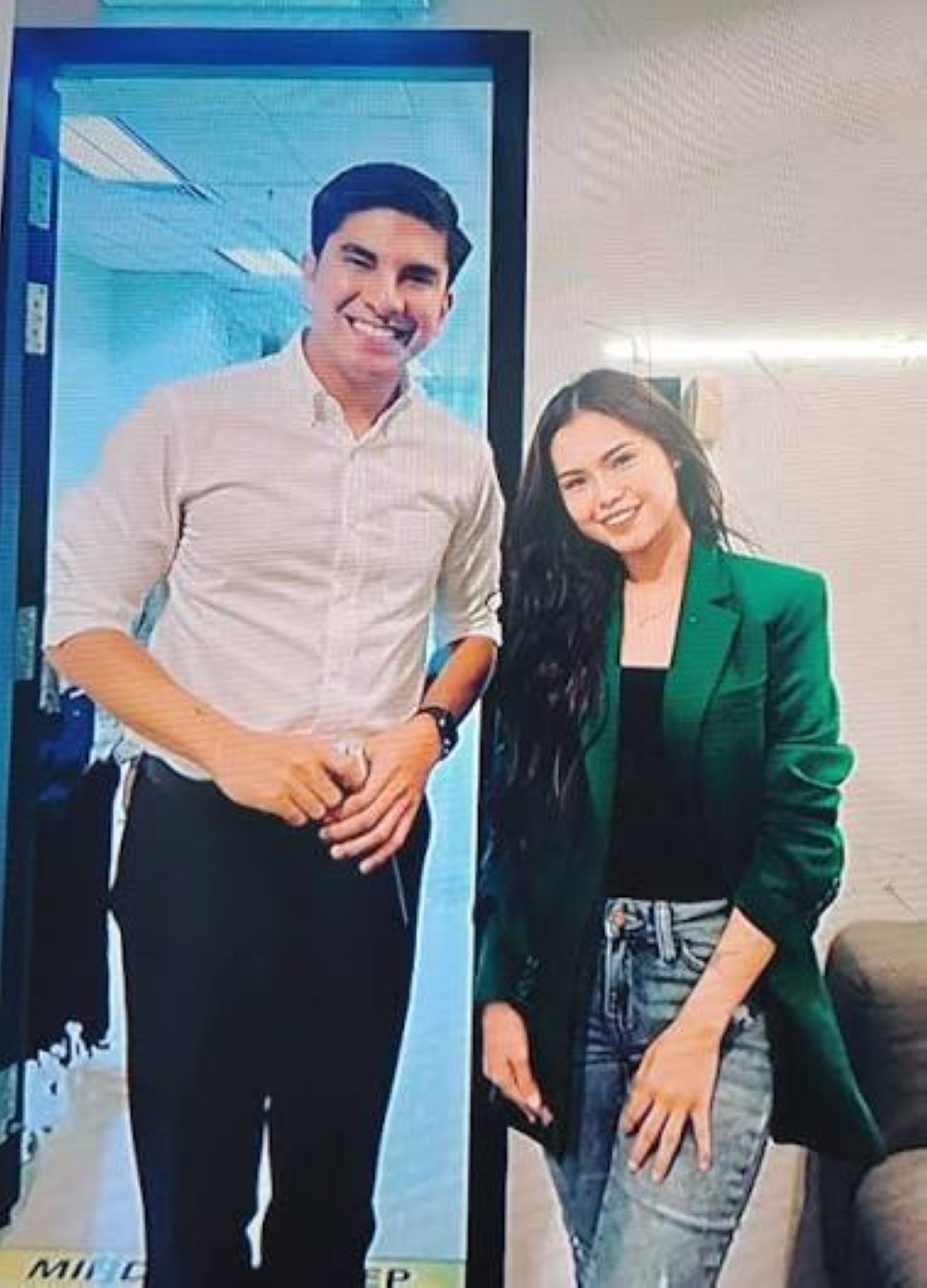 Syed Saddiq Syed Abdul Rahman and Bella Astillah pose for their first photo together during a chance encounter at a radio station in 2022, long before romance blossomed between them. — Picture via social media