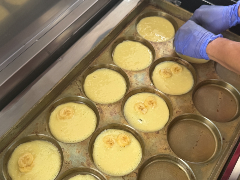 The food truck uses an electric griddle to cook the fluffy coconut milk pancakes. — Picture by Lee Khang Yi