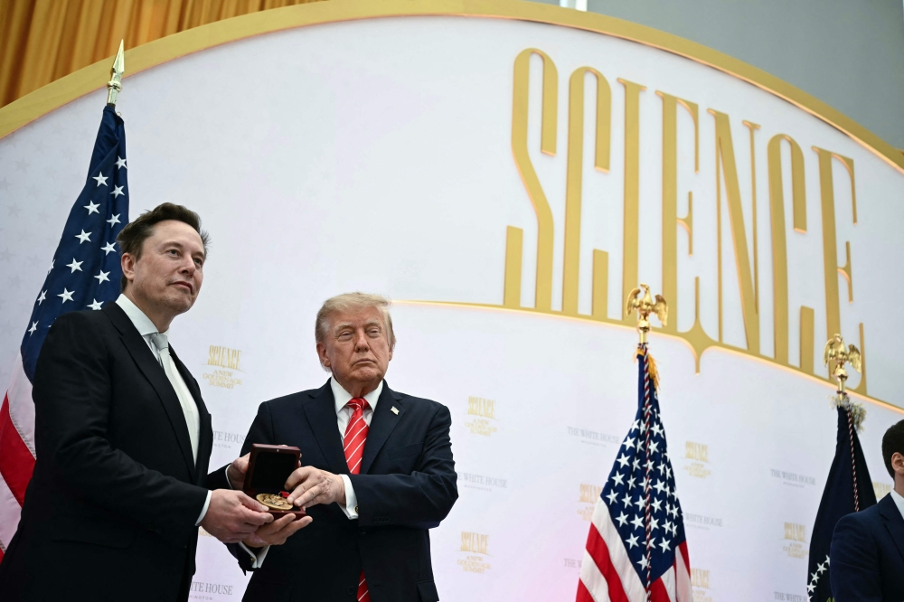 Trump calls Musk a ‘national treasure’ while handing him top US science honour