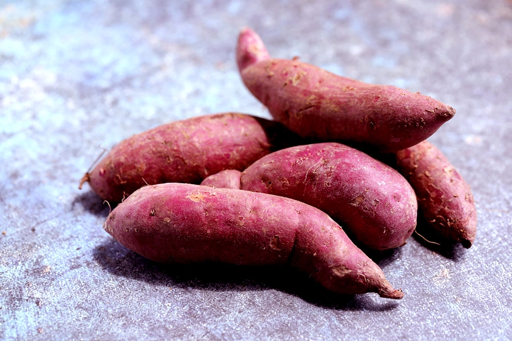 Uncooked sweet potatoes. — Picture by CK Lim