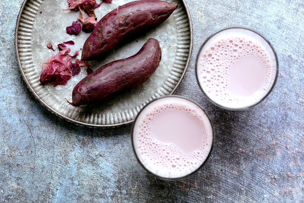 Cups of frothy, lavender-hued soy milk. — Picture by CK Lim