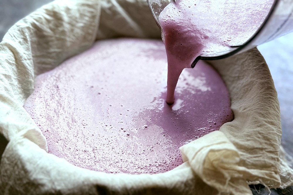 Strain the blended mixture through a muslin cloth or cheesecloth. — Picture by CK Lim
