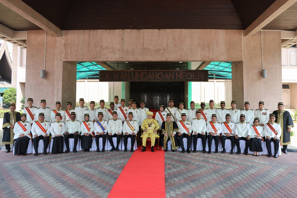 Negeri Sembilan Yang di‑Pertuan Besar Tuanku Muhriz Tuanku Munawir (centre) poses for a group photo with assemblymen during the opening of the State Legislative Assembly in Seremban on April 23, 2026. — Picture by Yusof Isa