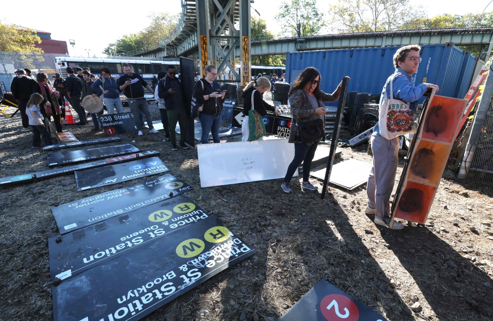 In south Brooklyn, shoppers hoping to get a slice of the city’s transit service waited for hours to trawl through an open-air market organised by city authorities. — AFP pic