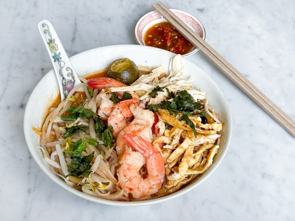 Sarawak Laksa Special isn’t your run-of-the-mill version as they make their own paste creating a lighter flavour that tastes homemade. — Picture by Lee Khang Yi