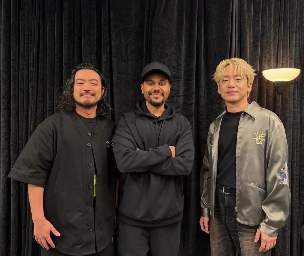 Japanese duo R-Shitei (left) and DJ Matsunaga (right) toured with Canadian singer The Weeknd (centre) after the After Hours Til Dawn concerts in Japan. — Picture from Instagram/Creepy Nuts