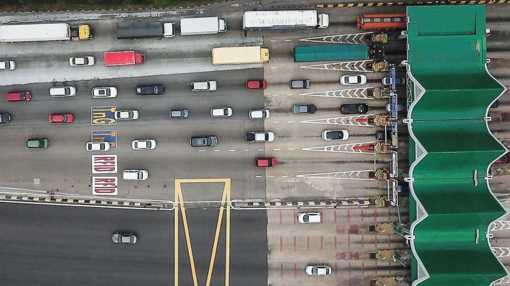 JustGo is a digital toll payment system that uses automatic number plate recognition (ANPR) to identify a vehicle and charge the debit or credit card linked to the motorist’s account. — Picture by Sayuti Zainudin 