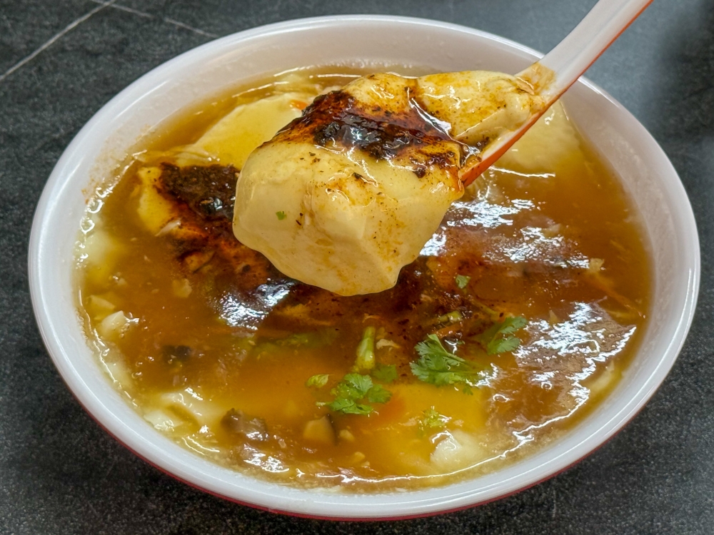 We only know the sweet version but try the Savoury Tofu Hua, a wobbly soybean milk custard paired with chili sauce — Picture by Lee Khang Yi