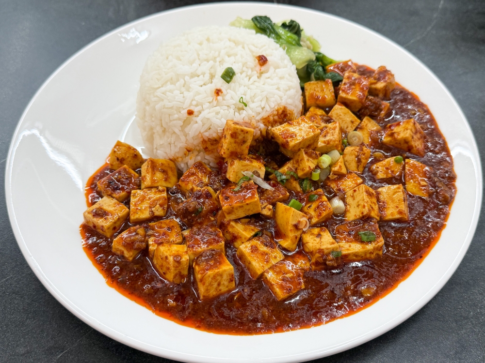 Various rice bowls catering to solo diners can be ordered like this Stir-Fried Spicy Tofu Rice Bowl — Picture by Lee Khang Yi