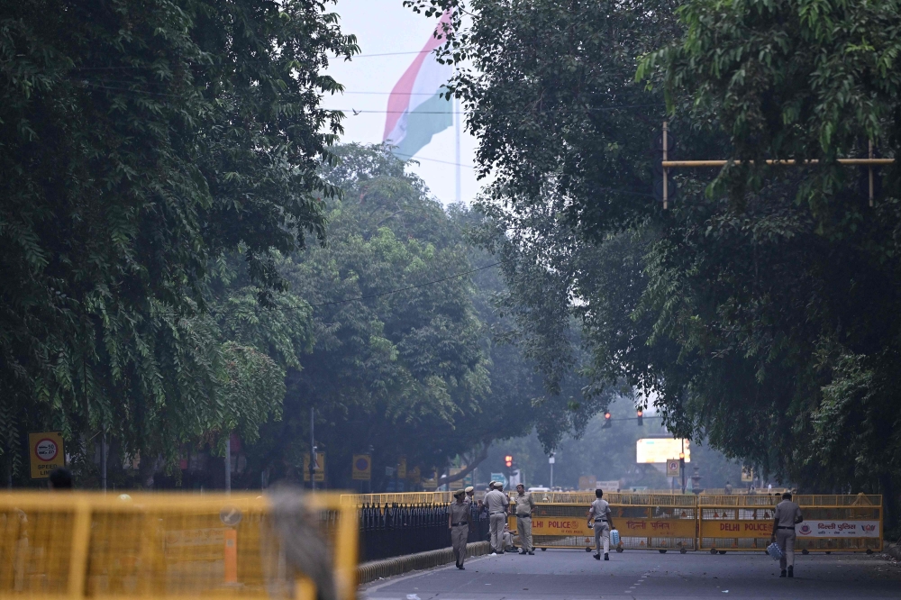 Delhi Police personnel barricade a street ahead of a protest by the youth-led Cockroach Janata Party (CJP) demanding the resignation of India’s Chief Election Commissioner over alleged ‘special intensive revision’ (SIR) voter-roll irregularities, near Jantar Mantar in New Delhi October 10, 2026. — AFP pic