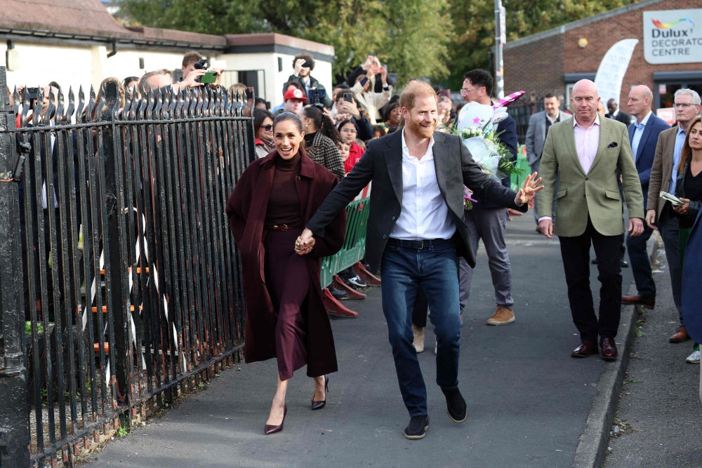 Britain’s Prince Harry, Duke of Sussex and his wife Meghan, Duchess of Sussex, arrive to visit the Community Recording Studio (CRS) in Nottingham October 15, 2026. — AFP pic