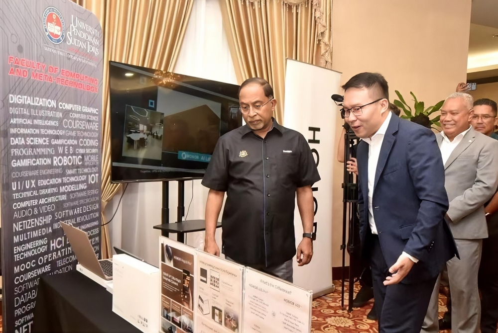 Higher Education Minister Datuk Seri Zambry Abd Kadir views a demonstration related to the HONOR AI Lab @ UPSI during the launch event at the university’s Sultan Azlan Shah Campus in Tanjong Malim. — Picture courtesy of HONOR Malaysia