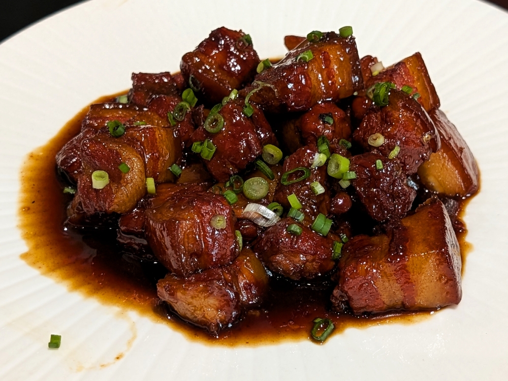 Shanghainese red-braised pork is much sweeter and stickier than the Hunan variant, and this version stays true to that. — Picture by Ethan Lau