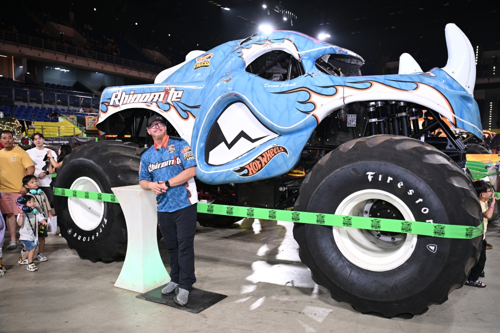 Darron Schnell in front of the Rhinomite monster truck he drove during the Hot Wheels Monster Trucks Live Glow-N-Fire Malaysia show at Unifi Arena. — Picture courtesy of MUSE Group Asia