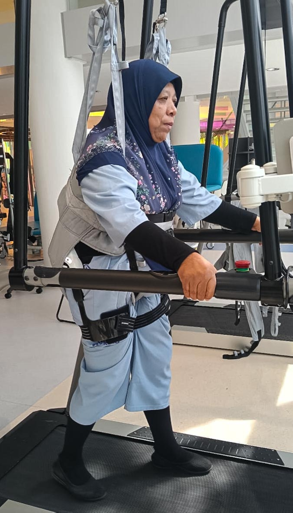 Salinah progressed from relying on a wheelchair to walking with a stick, before eventually being able to walk unaided after returning home. — Bernama pic
