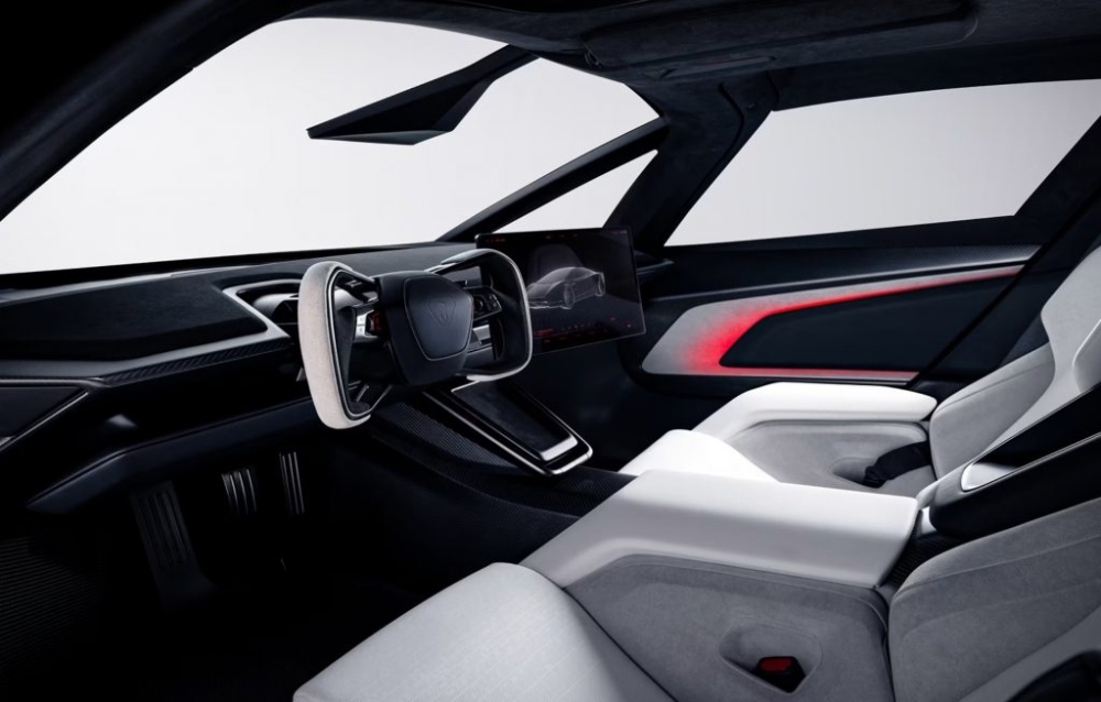 The Roadster features an Ultrawhite interior with grey microsuede detailing and seat bolsters designed to keep occupants firmly in place during aggressive driving.— SoyaCincau pic