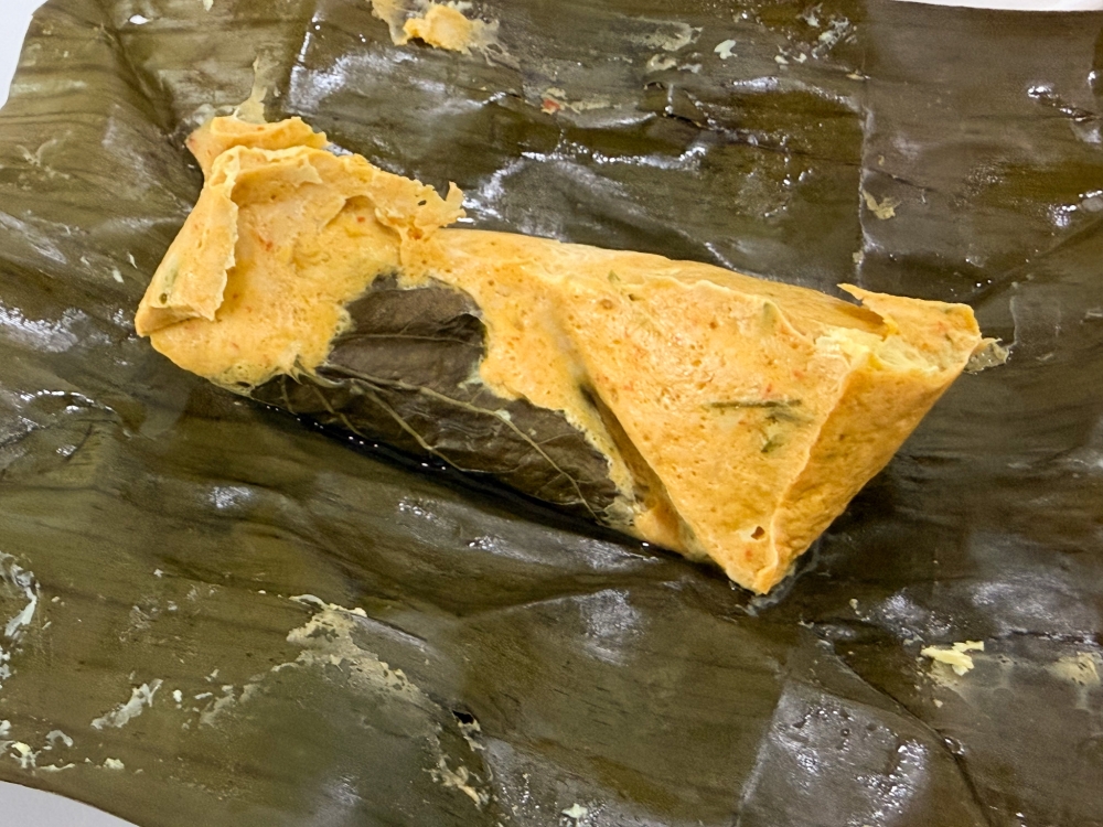 On Fridays, there’s ‘otak-otak’ in all of its rich, creamy glory. — Picture by Lee Khang Yi