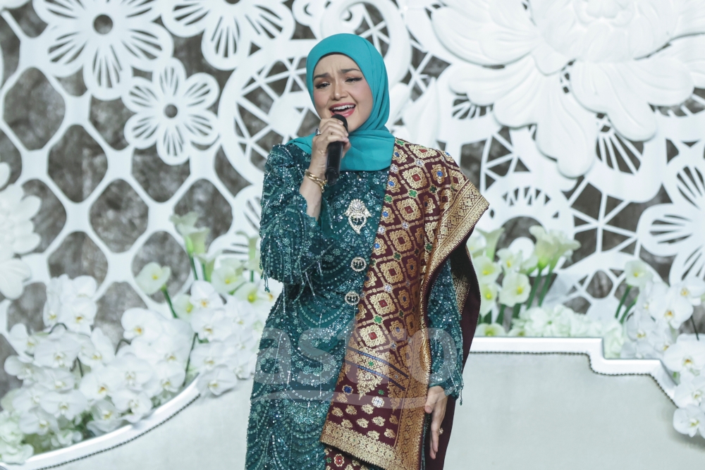 Datuk Seri Siti Nurhaliza performs at the Malaysia International Trade and Exhibition Centre (Mitec) during Muar MP Syed Saddiq Syed Abdul Rahman and singer-actress Bella Astillah’s wedding reception on October 18, 2026. — Picture courtesy of Astro