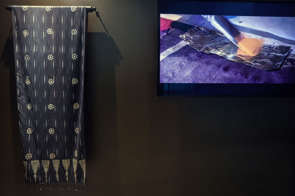 A traditional ‘telepuk’ textile adorned with gold-leaf floral motifs on display at the ‘Telepuk: The Imprint of Heritage’ exhibition at the Royal Selangor Visitor Centre in Kuala Lumpur. — Bernama pic