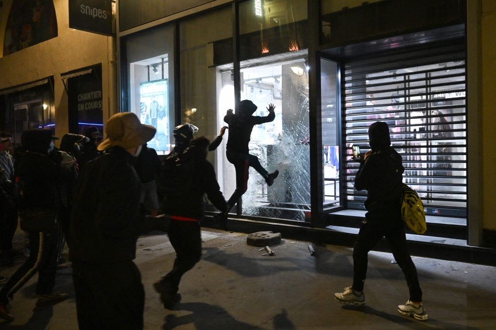Protesters near Chatelet in central Paris on October 18, 2026. — AFP pic