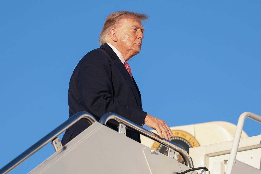US President Donald Trump boards Air Force One on October 20, 2026 in Joint Base Andrews, Maryland. — Getty Images via AFP