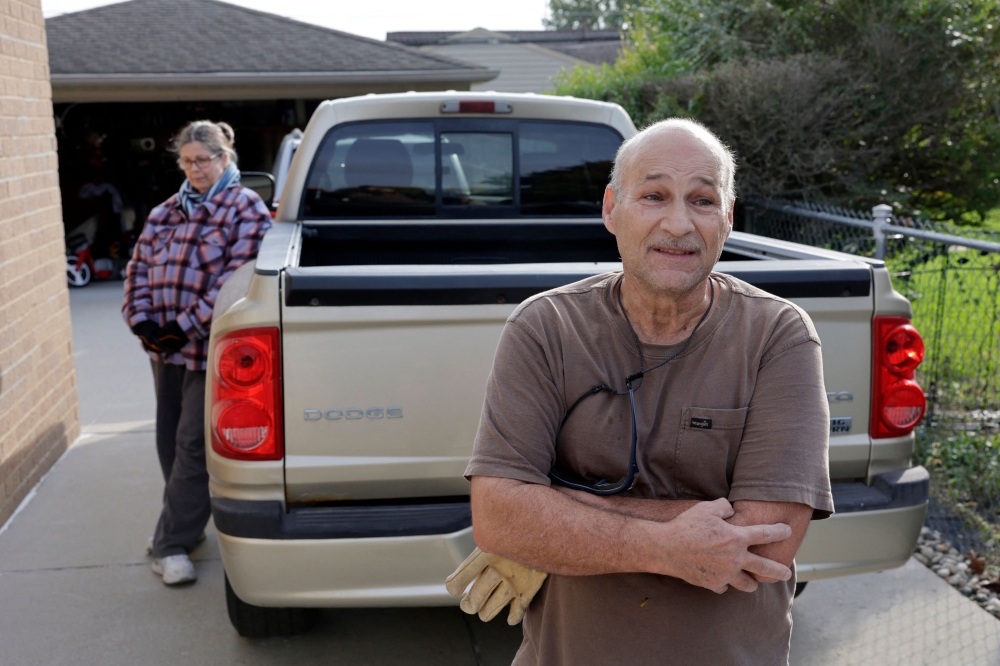 Mike, a 67-year-old retired carmaker at Chrysler, speaks with an AFP reporter about the upcoming midterm elections outside his home in Warren, Michigan, on October 10, 2026. — AFP pic 