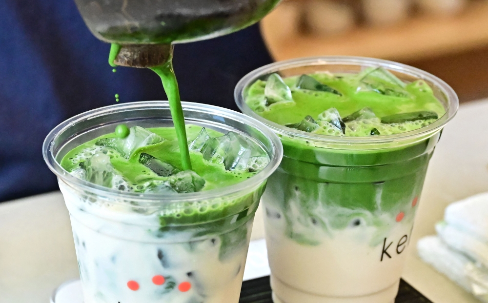 Matcha’s vibrant green colour makes it highly photogenic. — AFP pic