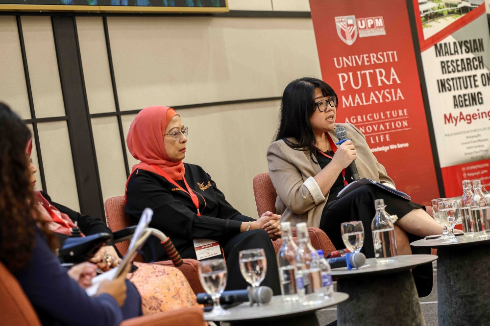 Temasek Polytechnic gerontology lecturer Nurdiyanah Kamsan (right) said it could be helpful for Malaysia to have an agency where caregivers could find information on the services and support available to them. — Picture by Sayuti Zainudin