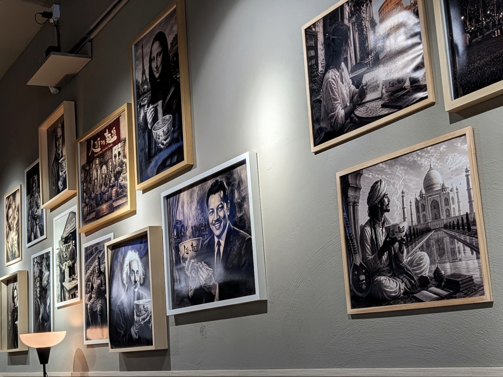 The restaurant is full of art depicting historical figures like Albert Einstein and P. Ramlee eating ‘ramen’. — Picture by Ethan Lau