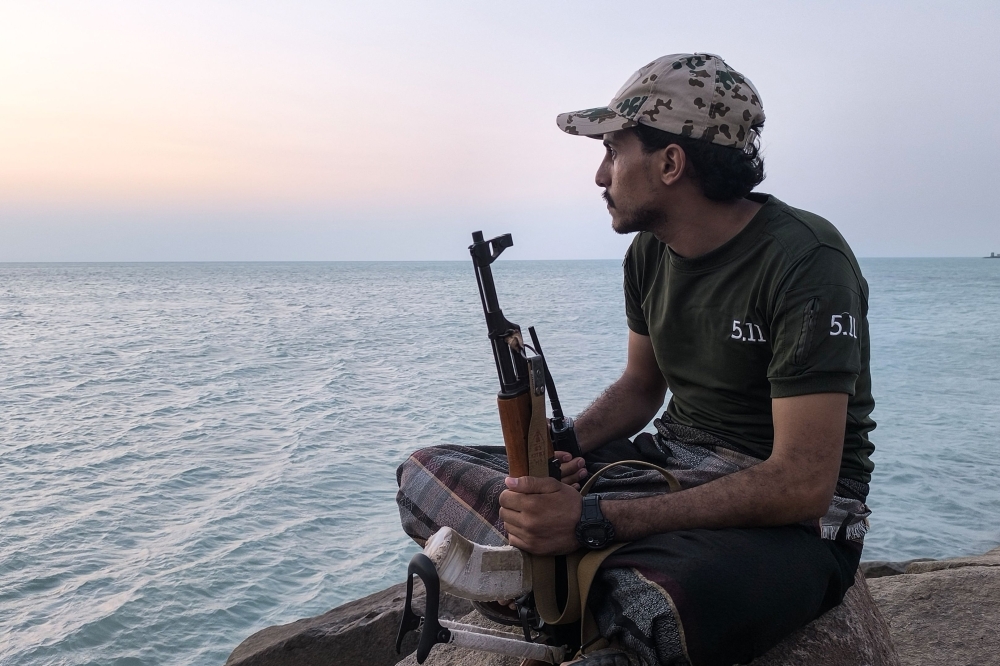 A Houthi fighter monitors the coastline in Mocha on October 16, 2026. The Saudi-led coalition fighting the Houthis has launched hundreds of raids in Yemen backing the internationally recognised government since the start of the renewed fighting in the long-running civil war. The conflict, dormant for years, erupted again in July and intensified after the Houthis seized the country’s Red Sea coast last month. — AFP pic